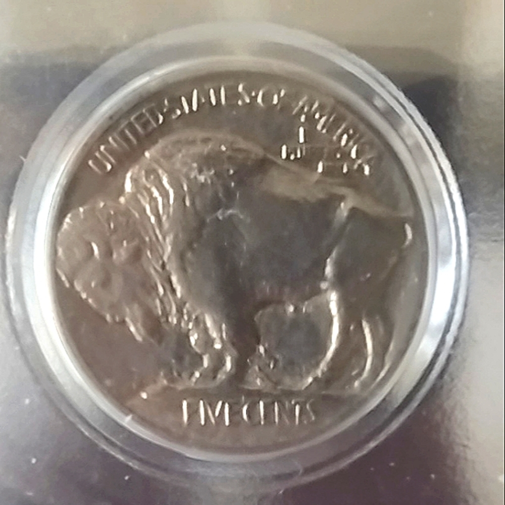 Listed is a choice AU Raised Ground 1913 Type 1 Buffalo Nickel
